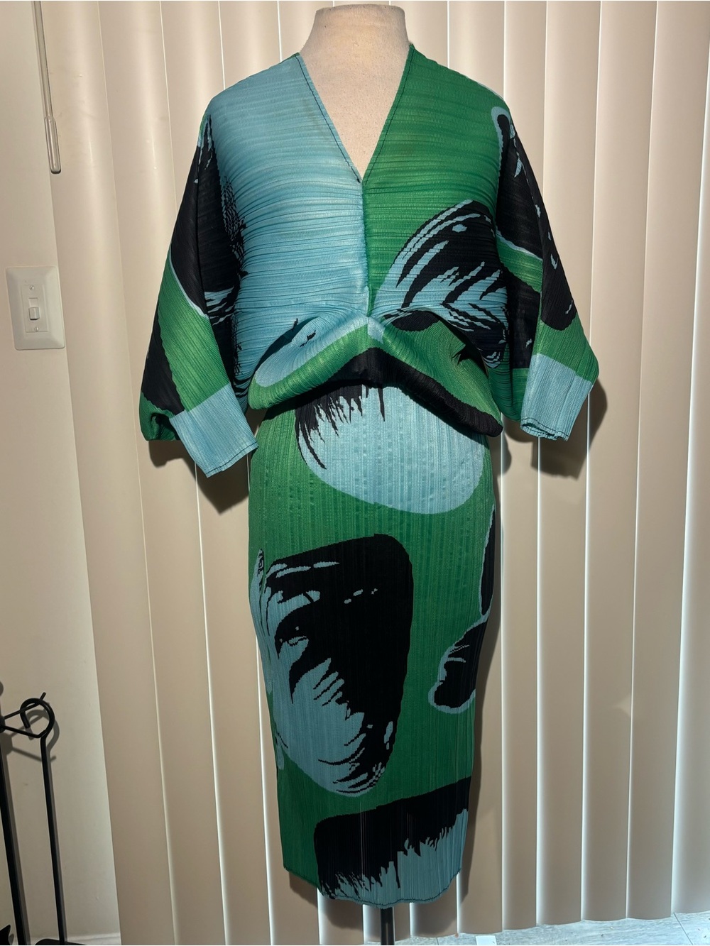 Green and blue design dress